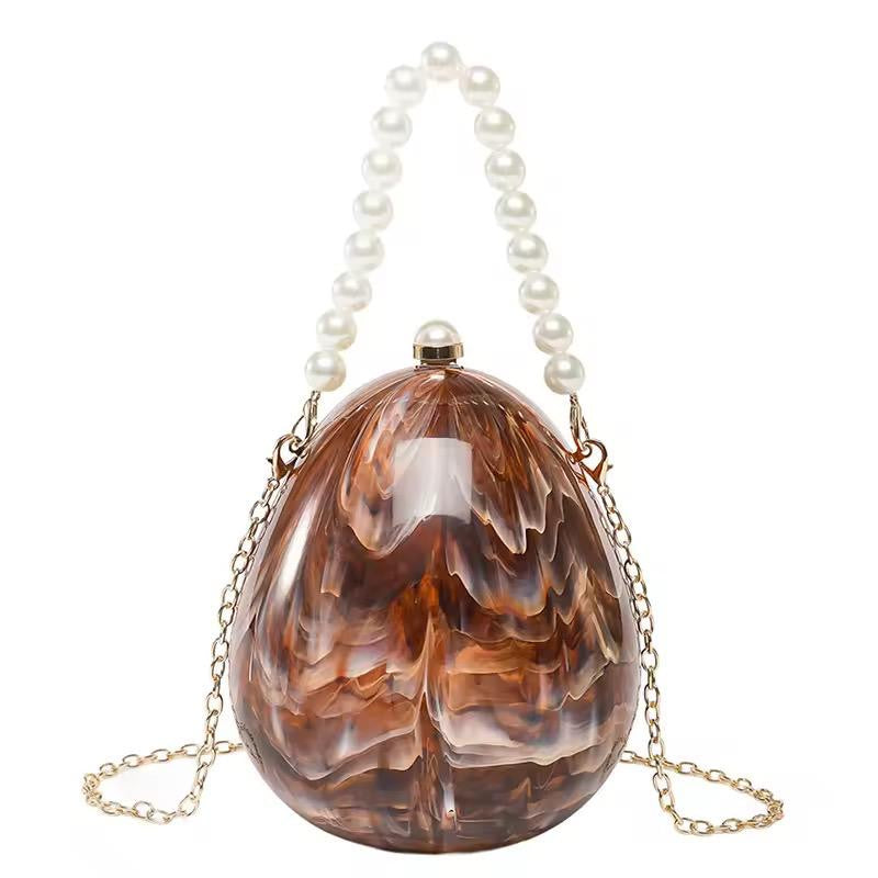 Egg shape Lux Clutch