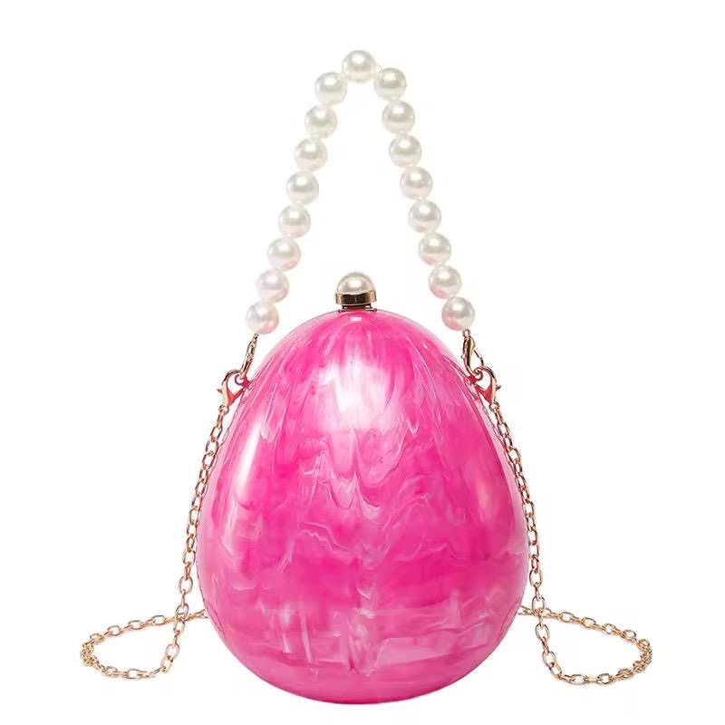 Egg shape Lux Clutch